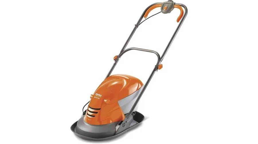 Lightweight Flymo hover lawn mower on a small UK lawn
